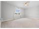 Simple bedroom with neutral decor and a window at 43015 Parkside Ct, Punta Gorda, FL 33982