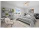 Large bedroom with a king-size bed and stylish decor at 43015 Parkside Ct, Punta Gorda, FL 33982