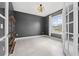 Spacious home office features large window and neutral wall color at 43015 Parkside Ct, Punta Gorda, FL 33982