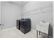 Convenient laundry room with washer, dryer, and utility sink at 43015 Parkside Ct, Punta Gorda, FL 33982