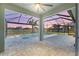 Relaxing screened pool and patio area overlooking a lake at 43015 Parkside Ct, Punta Gorda, FL 33982