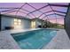 Relaxing screened pool and patio area, perfect for outdoor entertaining at 43015 Parkside Ct, Punta Gorda, FL 33982