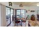 Casual breakfast nook with view of the pool and patio at 116 Colonial Sw St, Port Charlotte, FL 33952