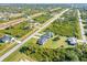 Aerial view of a house and neighborhood at 12333 Willmington Blvd, Port Charlotte, FL 33981
