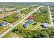 Aerial view of a house and neighborhood at 12333 Willmington Blvd, Port Charlotte, FL 33981