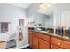 Bathroom boasts a granite countertop, double sink vanity, and a shower/tub combo at 12333 Willmington Blvd, Port Charlotte, FL 33981