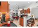Well-equipped kitchen with dark wood cabinets and granite countertops at 12333 Willmington Blvd, Port Charlotte, FL 33981