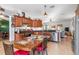 Eat-in kitchen with ample counter space, stainless steel appliances, and wood cabinets at 12333 Willmington Blvd, Port Charlotte, FL 33981