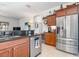 Kitchen boasts stainless steel appliances and a large island at 12333 Willmington Blvd, Port Charlotte, FL 33981