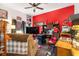 Home office with a comfortable sitting area and plenty of workspace at 12333 Willmington Blvd, Port Charlotte, FL 33981