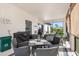 Enjoy this screened porch with outdoor dining space and a built-in grill at 12333 Willmington Blvd, Port Charlotte, FL 33981