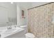 Clean bathroom with a shower/tub combo and updated vanity at 17458 Fuego Ln, Punta Gorda, FL 33955