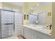 Bathroom with double sinks and shower at 17458 Fuego Ln, Punta Gorda, FL 33955