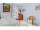 Bedroom with white bed frame and window at 17458 Fuego Ln, Punta Gorda, FL 33955