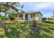 Charming single-story home with metal roof and lush lawn at 17458 Fuego Ln, Punta Gorda, FL 33955