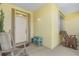 Front porch with rocking chairs and small table at 17458 Fuego Ln, Punta Gorda, FL 33955