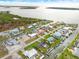 Aerial view of a waterfront property with a private pool at 1923 Pennsylvania Ave, Englewood, FL 34224