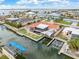 Aerial view of waterfront home with pool and dock at 1923 Pennsylvania Ave, Englewood, FL 34224