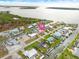 Aerial view of a waterfront property with a private pool at 1923 Pennsylvania Ave, Englewood, FL 34224