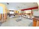 Open concept game room featuring a pool table, tiled floors, and ample lighting at 1923 Pennsylvania Ave, Englewood, FL 34224