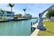 Picturesque waterfront canal with docks and lifts leading to beautiful coastal homes at 1923 Pennsylvania Ave, Englewood, FL 34224