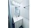 Bathroom with a sink, a light fixture with multiple bulbs and mirror at 207 Blackburn Blvd, North Port, FL 34287