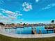 Scenic view of the community marina and docks with beautiful blue water at 207 Blackburn Blvd, North Port, FL 34287