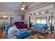 Spacious living room with two sofas and a view into the sunroom at 21533 Dawson Ave, Port Charlotte, FL 33952