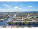 Aerial view of waterfront property, showcasing the community and canal access at 3800 Bal Harbor Blvd # 312, Punta Gorda, FL 33950