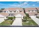 Two-story home with attached garage and lush landscaping at 3800 Bal Harbor Blvd # 312, Punta Gorda, FL 33950