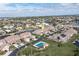 Aerial view of canal-front property, highlighting its location and pool at 3800 Bal Harbor Blvd # 312, Punta Gorda, FL 33950