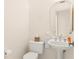 Clean and simple bathroom with toilet and pedestal sink at 3800 Bal Harbor Blvd # 312, Punta Gorda, FL 33950