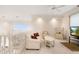 Comfortable sitting area with sofa and armchair at 3800 Bal Harbor Blvd # 312, Punta Gorda, FL 33950