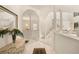 Bright and spacious entry with high ceilings and a large mirror at 3800 Bal Harbor Blvd # 312, Punta Gorda, FL 33950