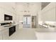 Modern kitchen with stainless steel appliances and white cabinets at 3800 Bal Harbor Blvd # 312, Punta Gorda, FL 33950