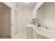 Convenient laundry room with washer, dryer, and cabinets at 3800 Bal Harbor Blvd # 312, Punta Gorda, FL 33950