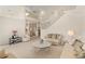 Spacious living room with high ceilings, two sofas, and a coffee table at 3800 Bal Harbor Blvd # 312, Punta Gorda, FL 33950