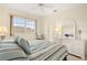 Main bedroom with a large bed and built-in dresser at 3800 Bal Harbor Blvd # 312, Punta Gorda, FL 33950
