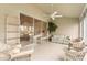 Peaceful sunroom with canal view and comfortable seating at 3800 Bal Harbor Blvd # 312, Punta Gorda, FL 33950