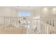 Spacious upper landing overlooking main living area at 3800 Bal Harbor Blvd # 312, Punta Gorda, FL 33950