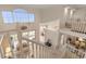 Open upper landing with view of living room and sunroom at 3800 Bal Harbor Blvd # 312, Punta Gorda, FL 33950