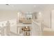 Bright loft area with white railings overlooking the main floor at 3800 Bal Harbor Blvd # 312, Punta Gorda, FL 33950