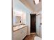Clean bathroom with tiled shower and vanity with storage at 683 W Tarpon Nw Blvd, Port Charlotte, FL 33952