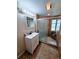 Bathroom with vanity, shower, and tile flooring at 683 W Tarpon Nw Blvd, Port Charlotte, FL 33952
