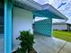 Teal decorative screen adds curb appeal to this home's exterior at 683 W Tarpon Nw Blvd, Port Charlotte, FL 33952