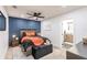 Cozy bedroom with a plush bed, stylish decor and ensuite bathroom at 1010 Robinhood Dr, Punta Gorda, FL 33982