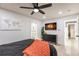 Spacious bedroom with large TV and plenty of closet space at 1010 Robinhood Dr, Punta Gorda, FL 33982