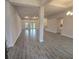 Spacious open-concept living room with recessed lighting and stylish tile flooring at 14146 Baracoa Ln, Port Charlotte, FL 33981