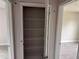 Spacious closet with white wire shelving and baseboard trim at 14154 Baracoa Ln, Port Charlotte, FL 33981