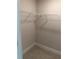 Spacious closet with white wire shelving and baseboard trim at 14154 Baracoa Ln, Port Charlotte, FL 33981